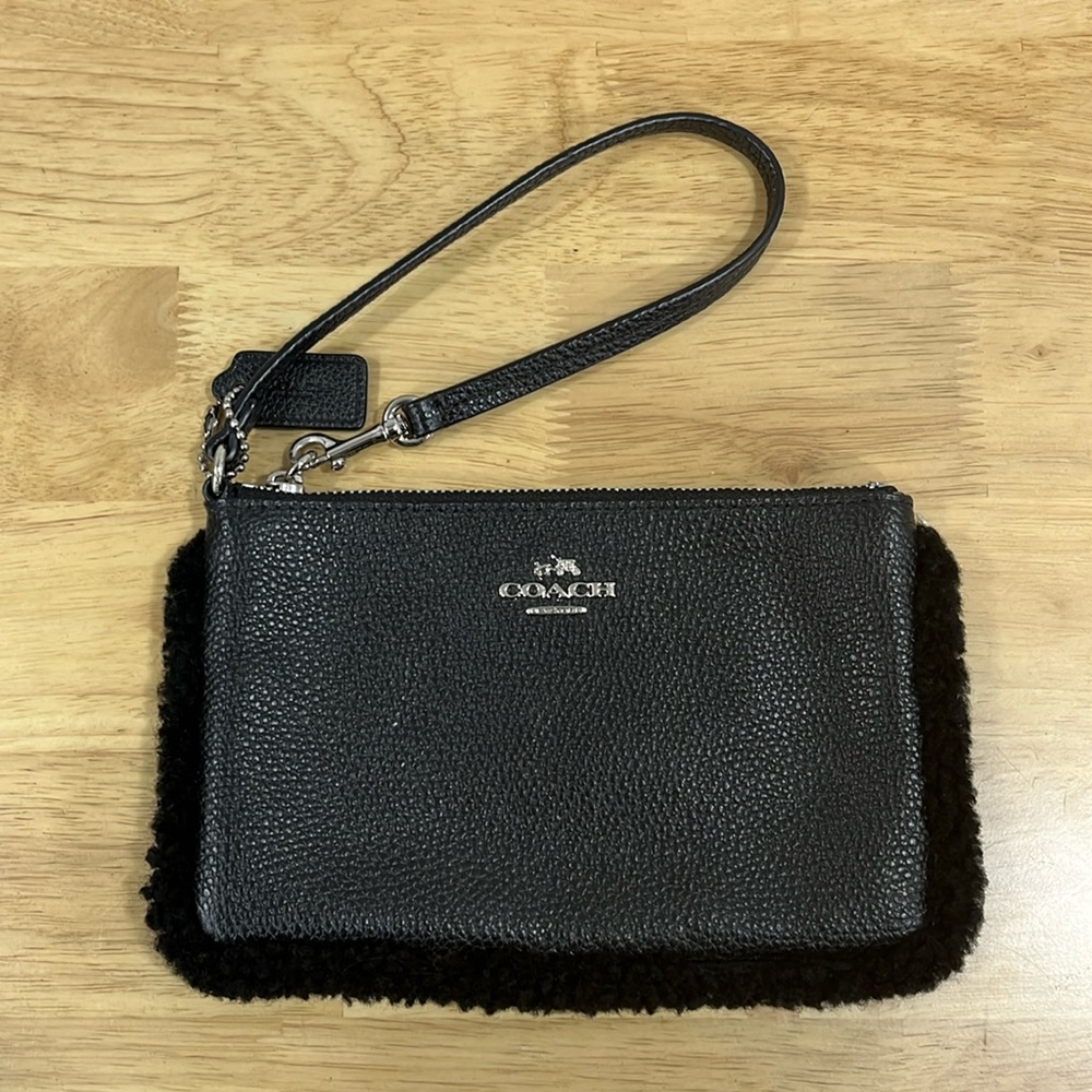 COACH Black Wristlet with sherpa detailing